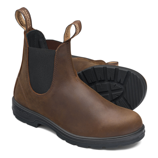 A pair of unisex, brown leather boots with black leather interior lining.