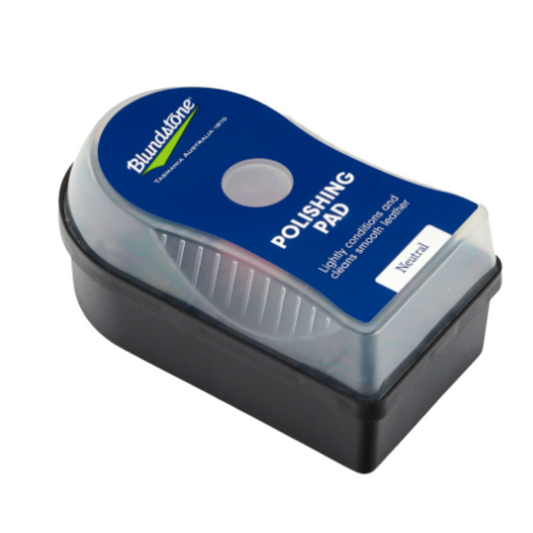 The outer packaging of the polishing pad. Blue front label, clear plastic and a black plastic backing.
