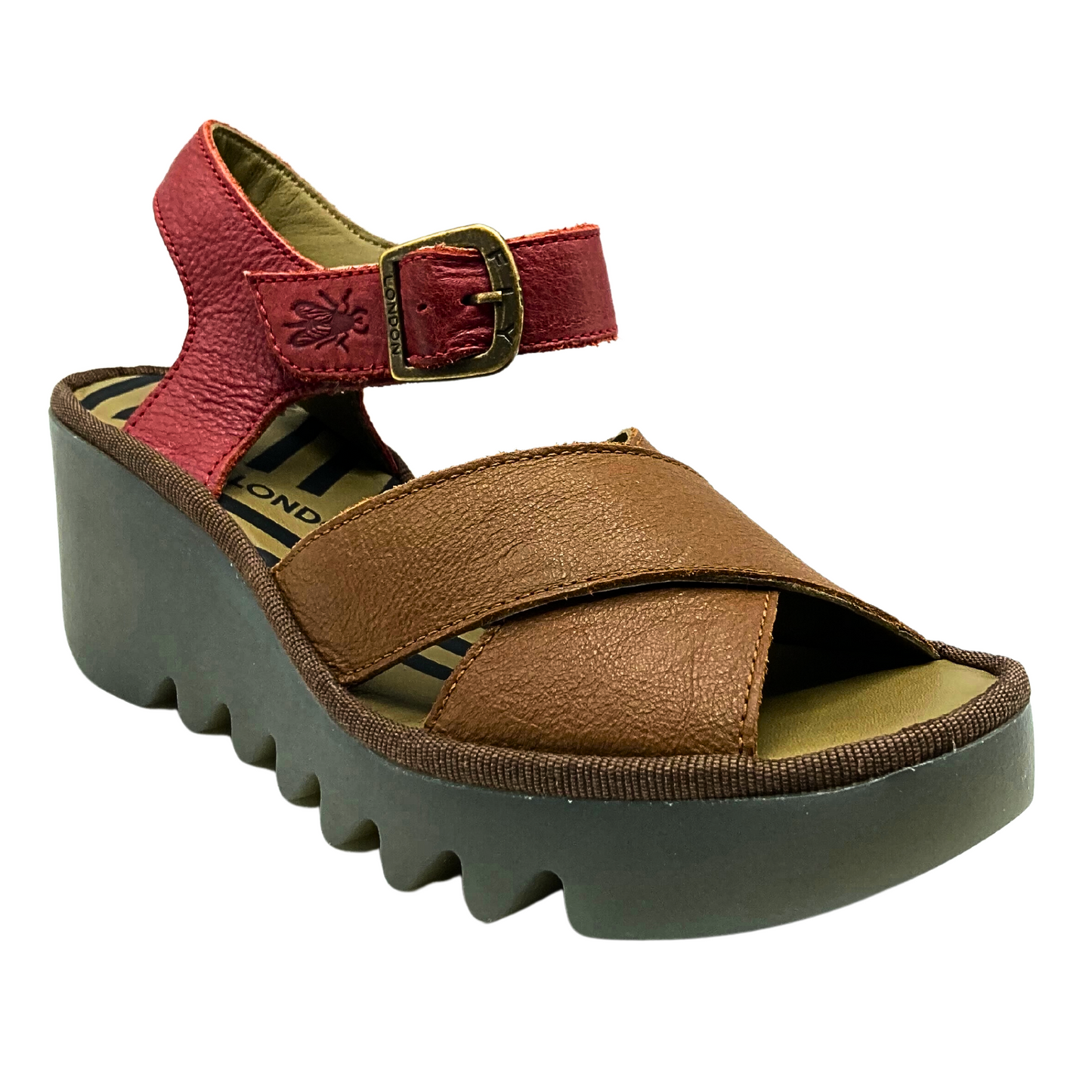 An angled front view of the Fly London Have sandal. Classic Fly wedge sole with cross straps at front as well as heel/ankle strap