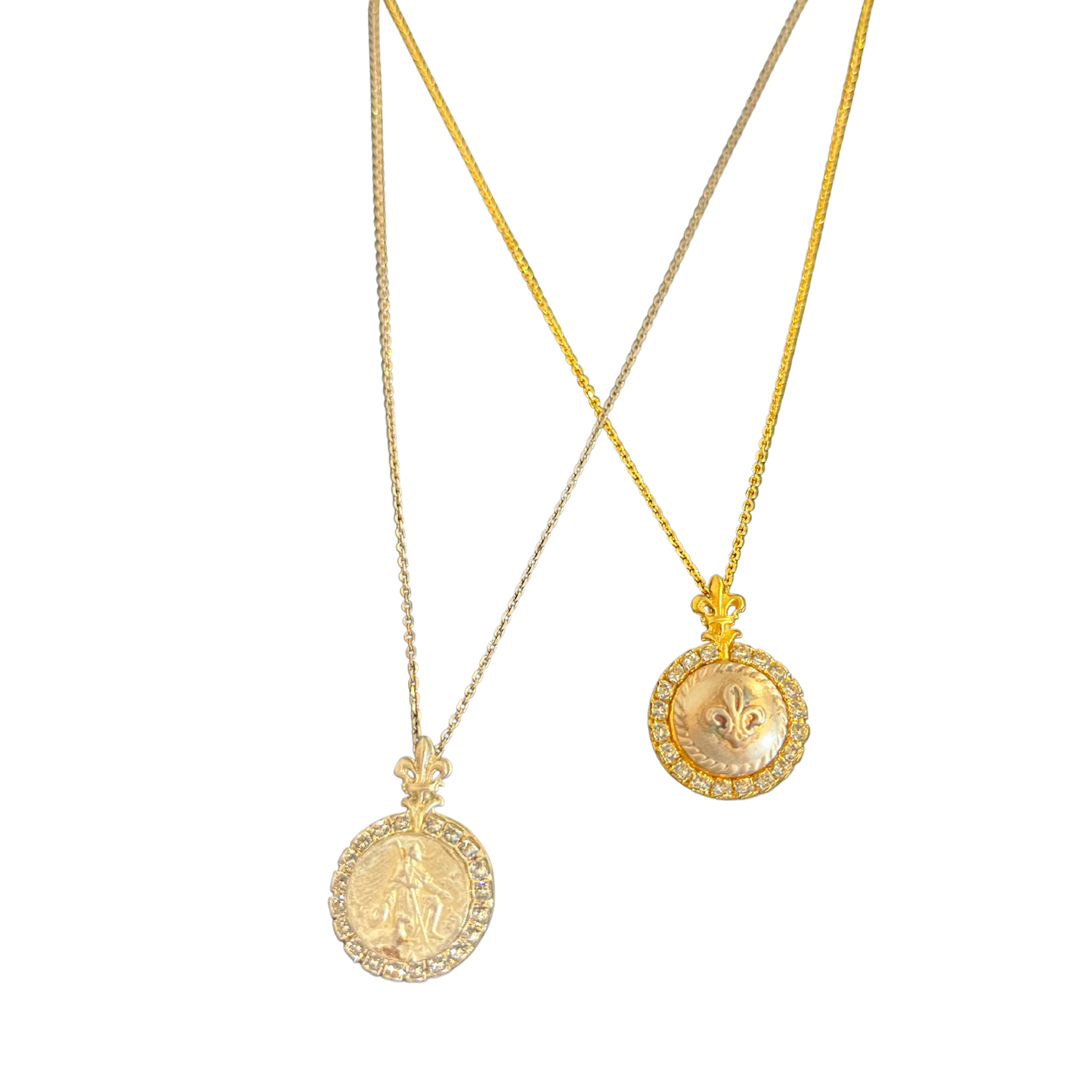 Two gold necklaces with engraved medallions.