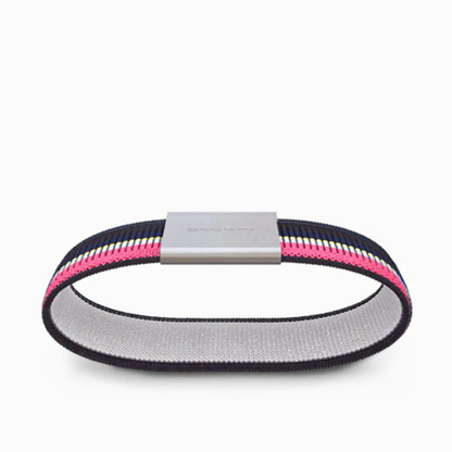 The neon pink stripped band is pictured from below revealing the light grey lining. The silver metal buckle sits on the top of the loop.