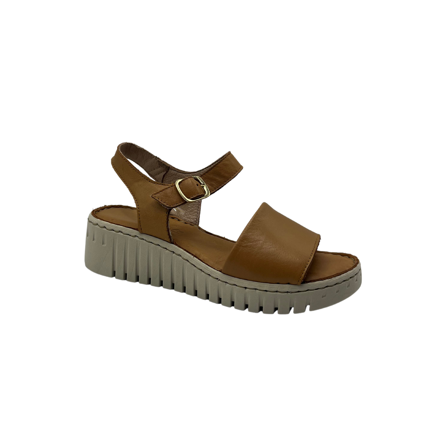 The Tyche Talon sandal features a smooth camel-colored leather upper and an open-toed silhouette.