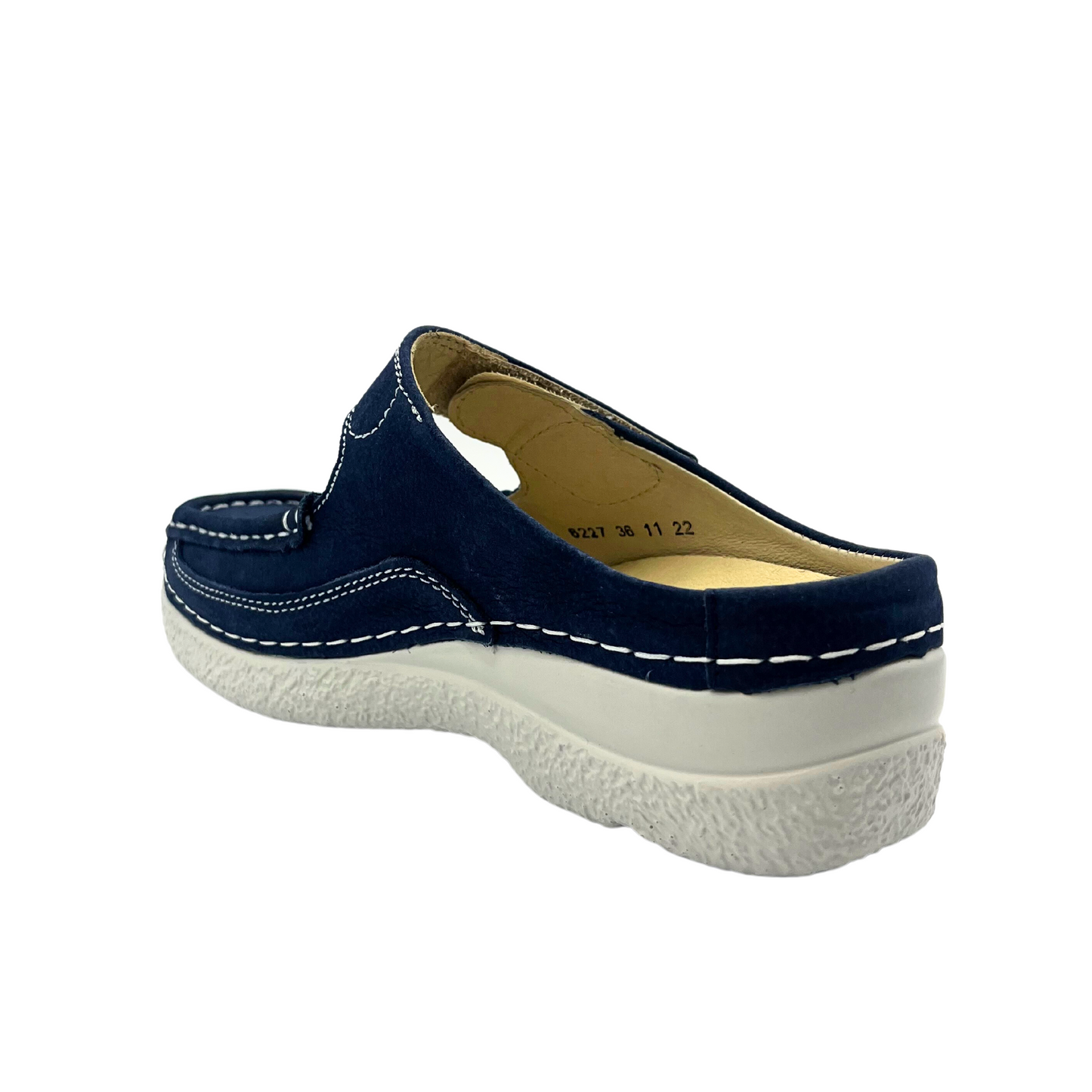Angled back view of closed toe loafer with open heel. Anatomically shaped footbed is removable. Contrast white stitching against blue upper and white sole