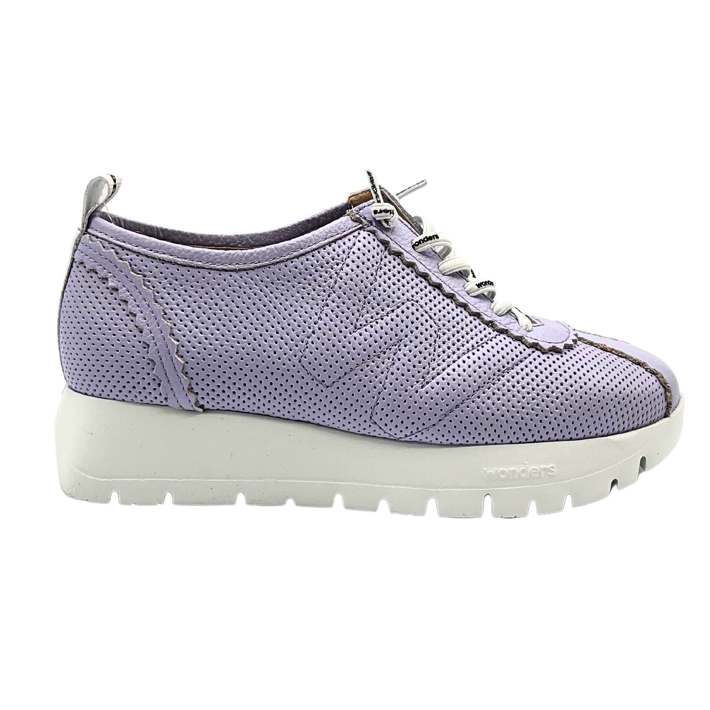 Outside view of sporty fashion sneaker in a lilac color. Sole is white