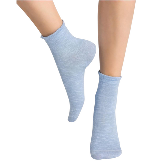 A pair of light blue ankle height socks is pictured featuring a frilled top.