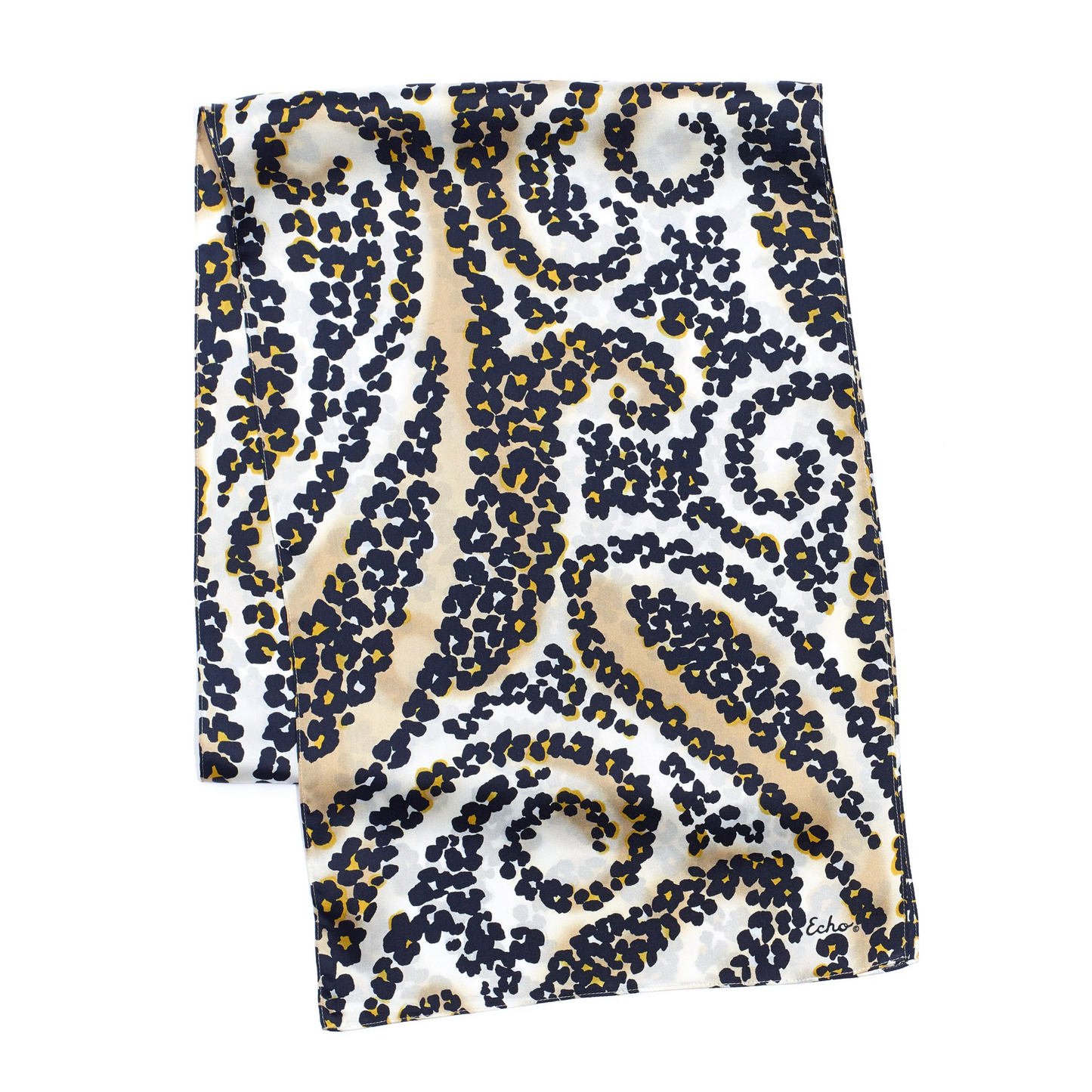 A cream and tea-stained coloured scarf with spotted pattern in swirling forms is pictured folded.