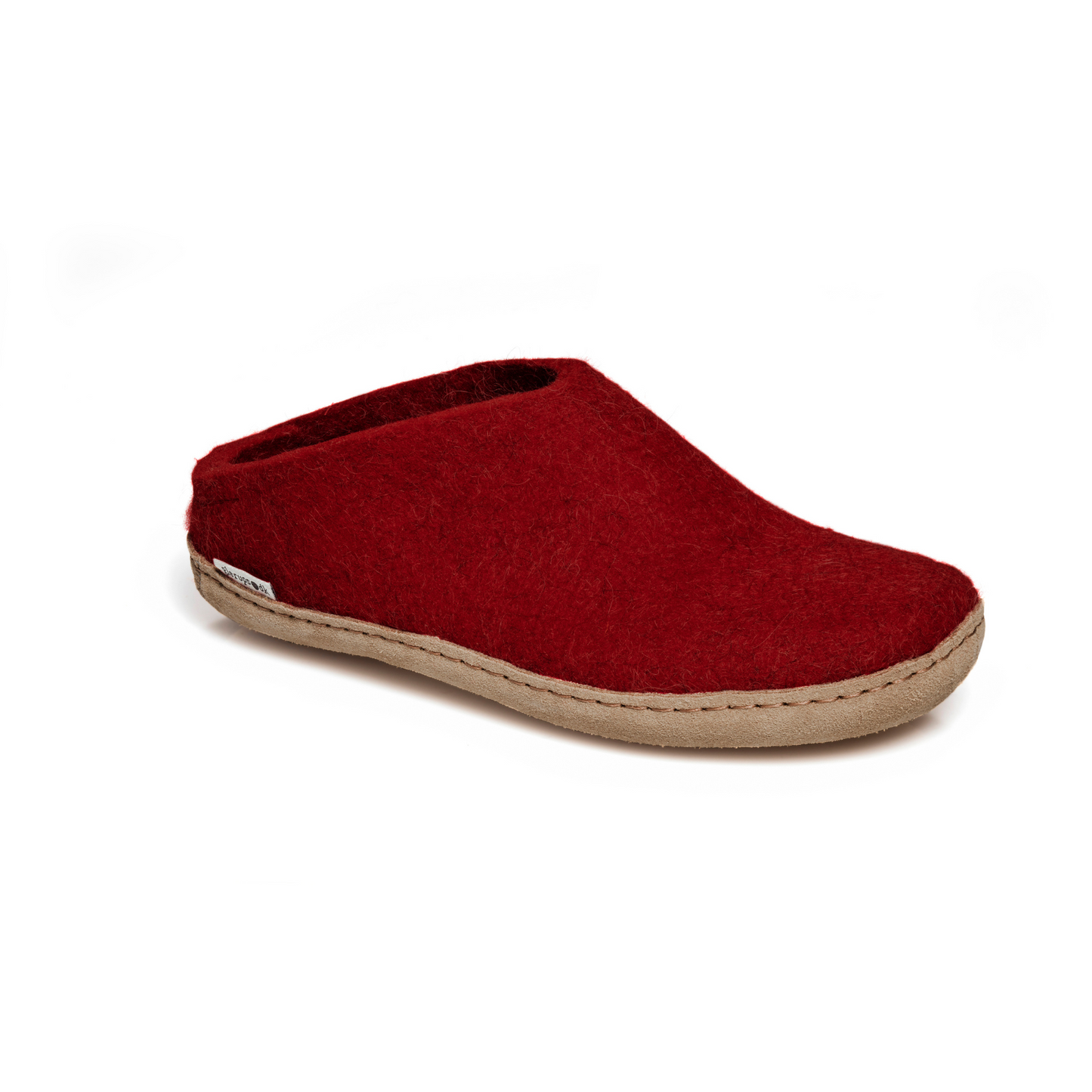 A felted deep crimson slipper pictured at a slight angle, showing part of the top front and side of the slipper. A tan leather sole lines the bottom of the shoe with a row of stitching.
