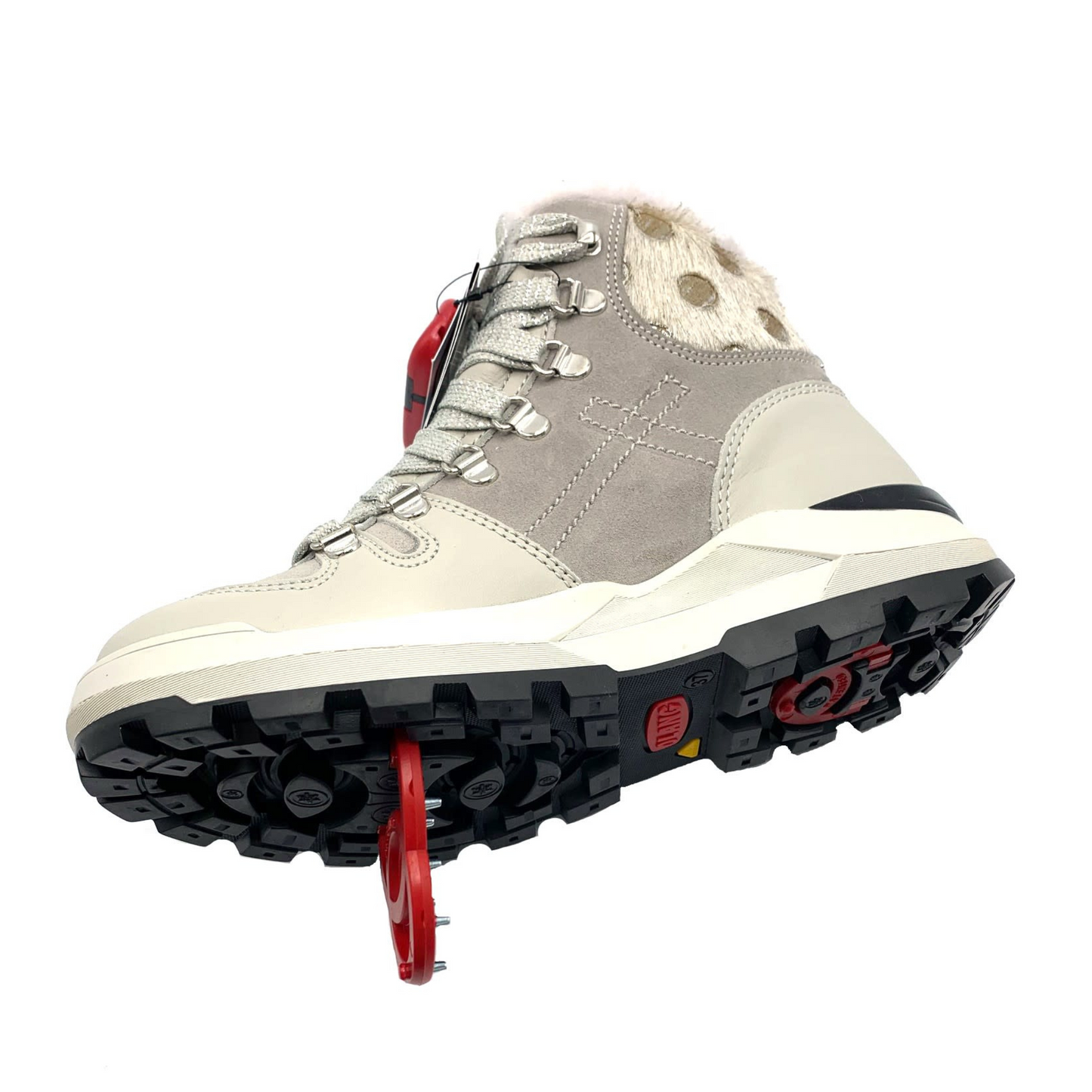 A bottom angle view of a light grey lace-up boot with suede and fur details and a grippy black outsole.
