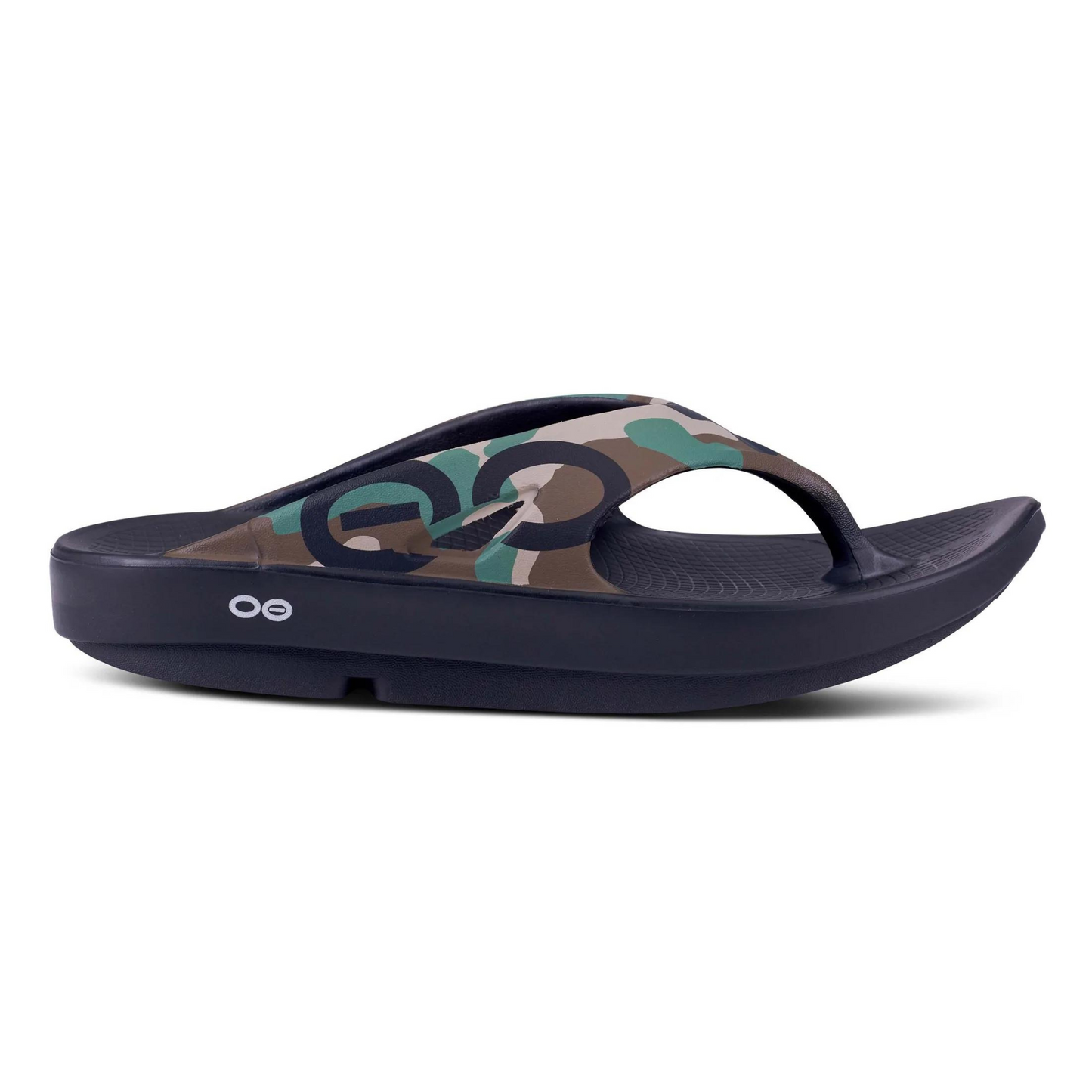 Black soled flip-flop with thick arched toe and camo-print upper pictured in profile.