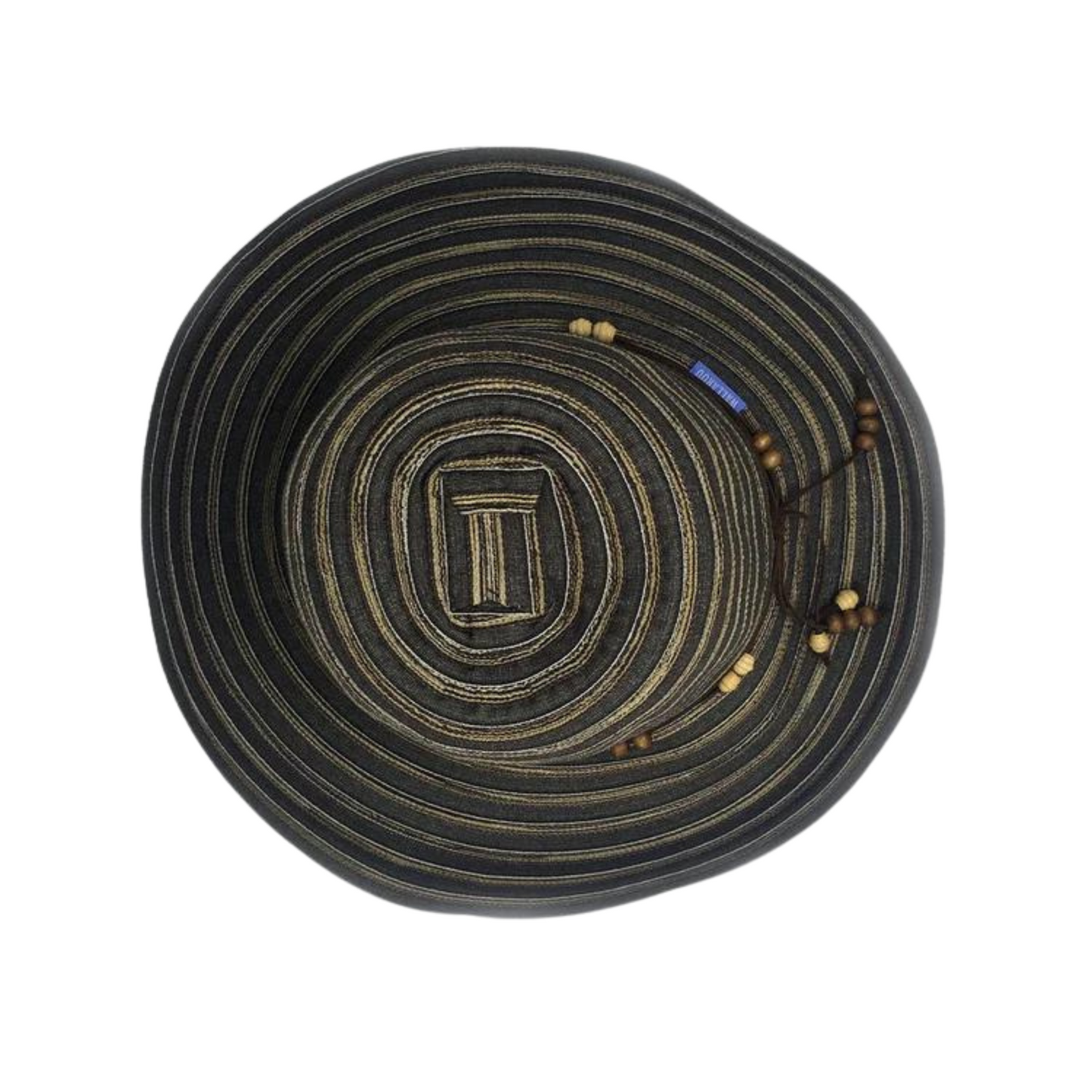 The top of the brown hat shows the beige trim spiralling down the entirety of the surface with the brown beaded string visible.