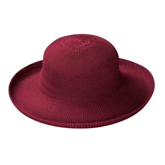 A rich deep red weaved hat with soft curvature and rolled in brim.