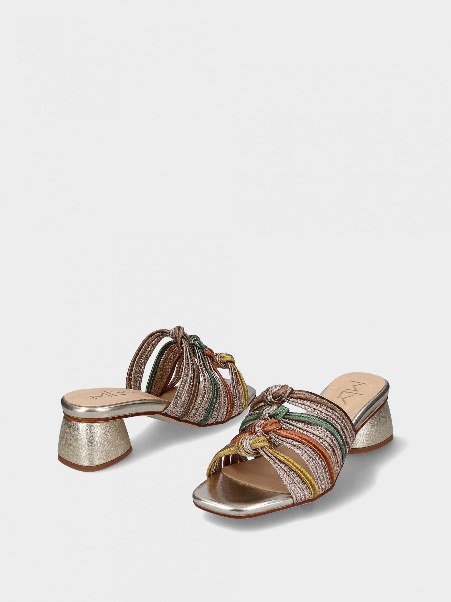 Multicolored sandal with a block heel on a light gray background