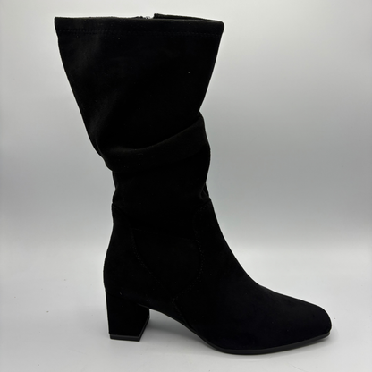 Right facing view of a black slouchy boot with a block heel