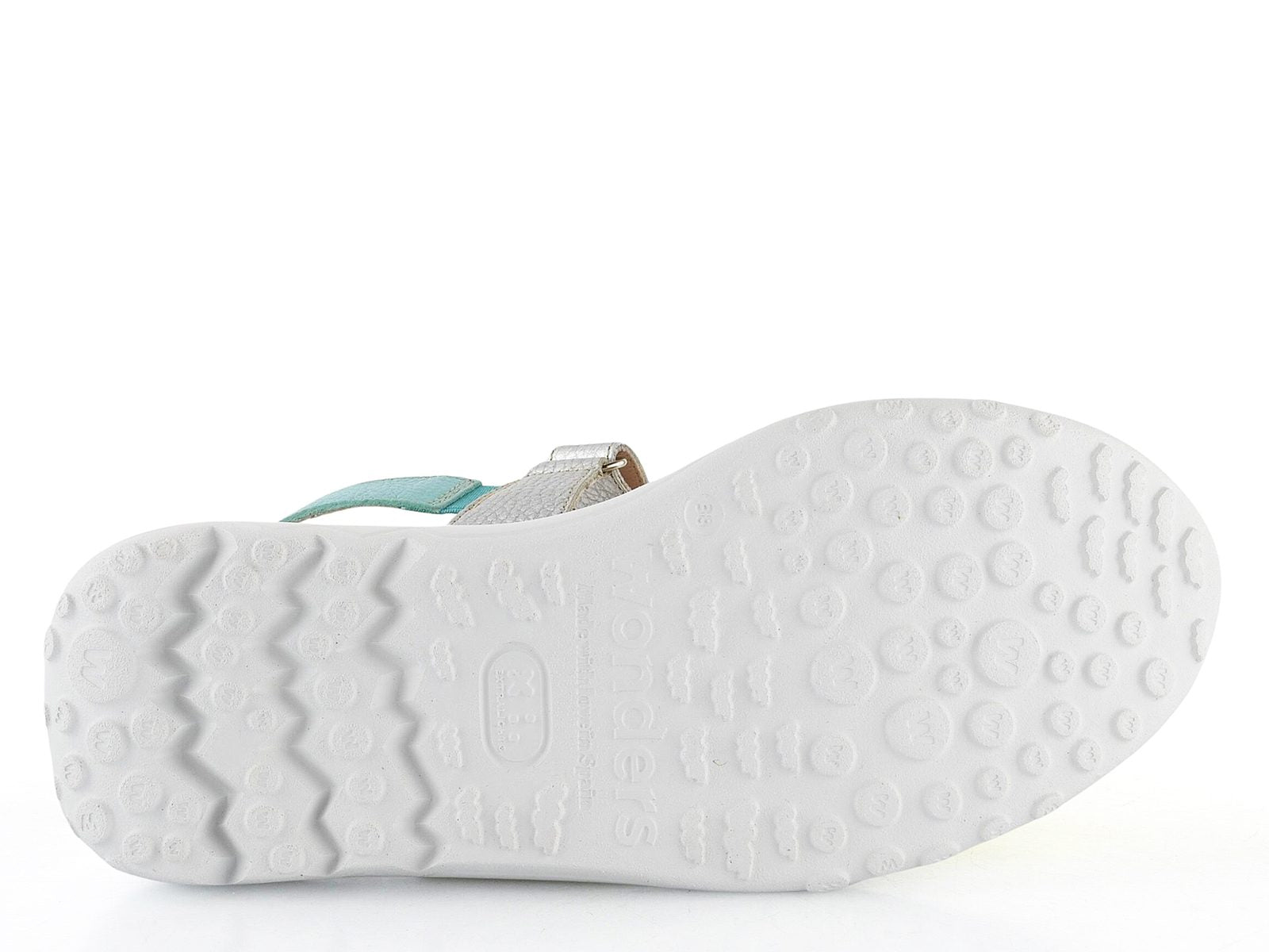 White shoe sole with a textured pattern on a white background