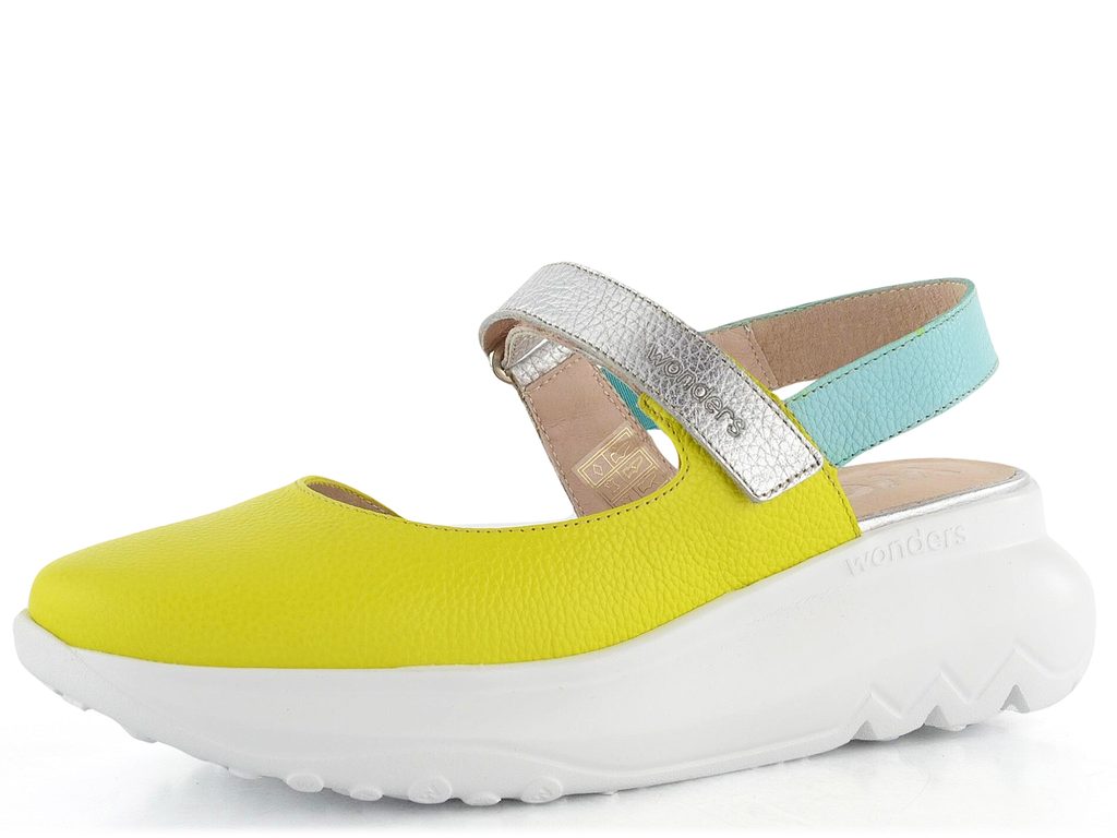 Yellow shoe with a white sole on a white background