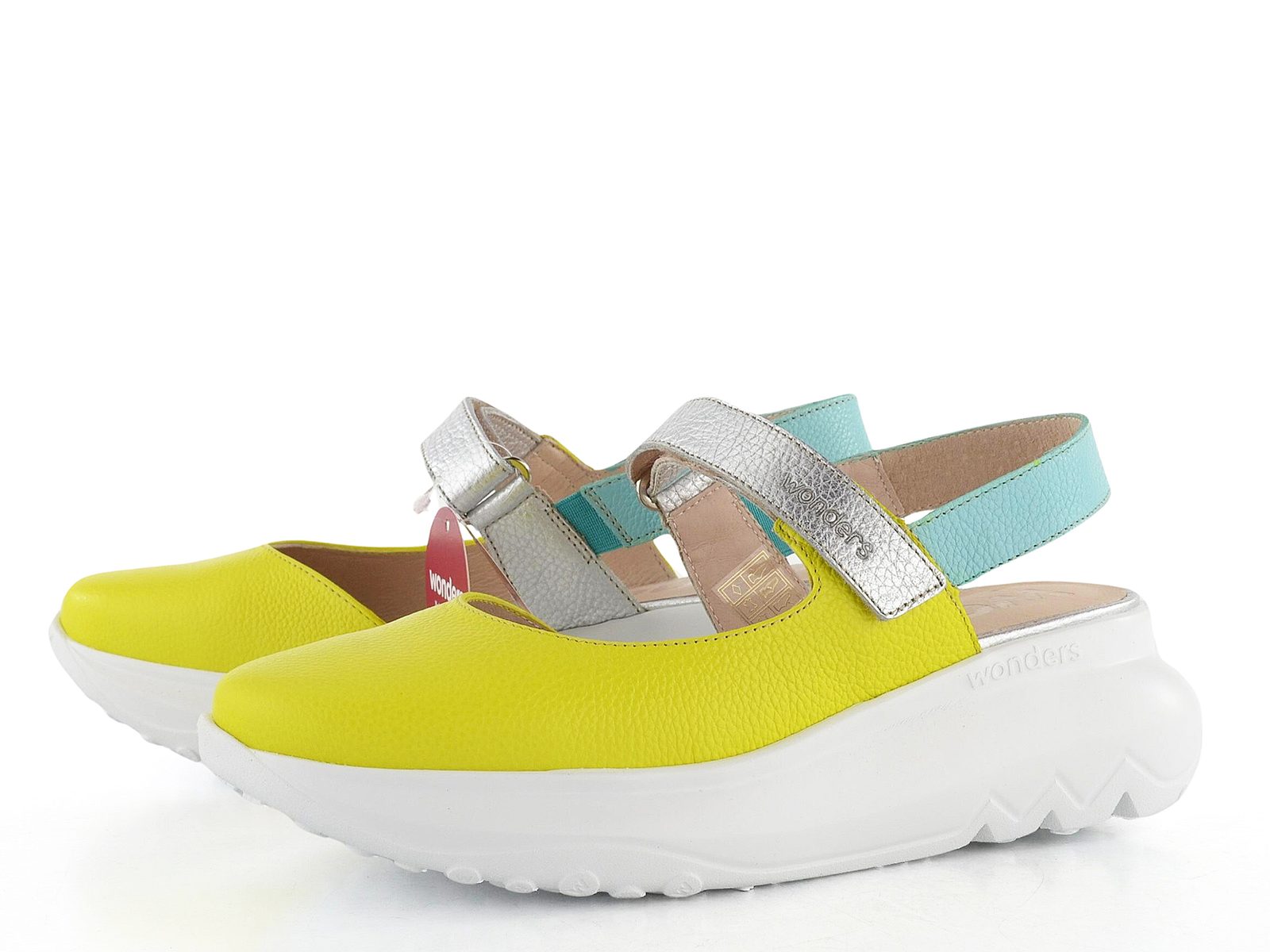 Colorful sandals with a yellow upper and silver and blue straps on a white background