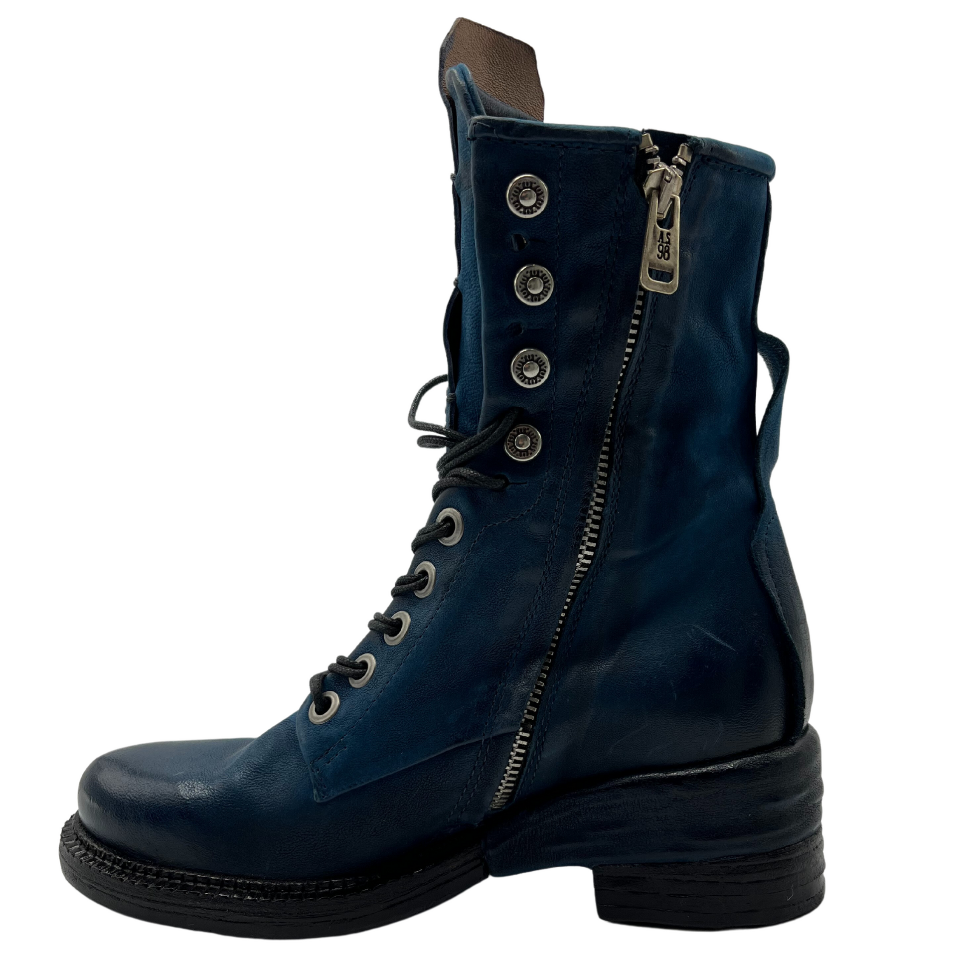 Left facing view of blue leather boot with silver side zipper closure and short block heel