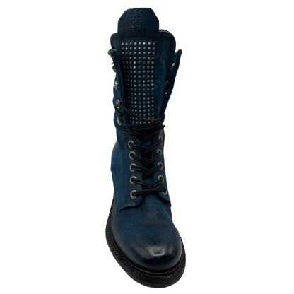 Top view of blue leather mid-calf boot with black laces and embellishments on upper