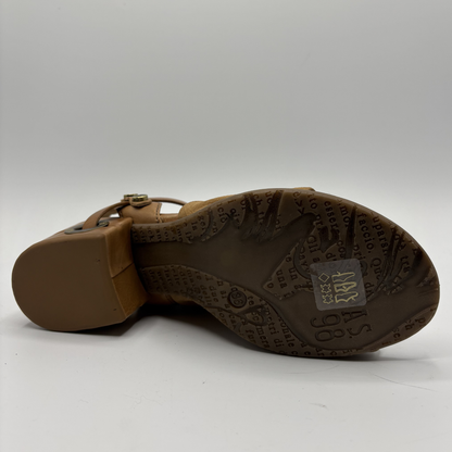 Brown sandal sole with brand logo on a white background