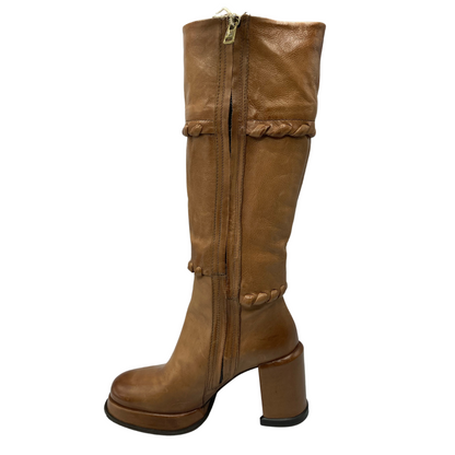 Left facing view of brown leather boot with side zipper closure and block heel