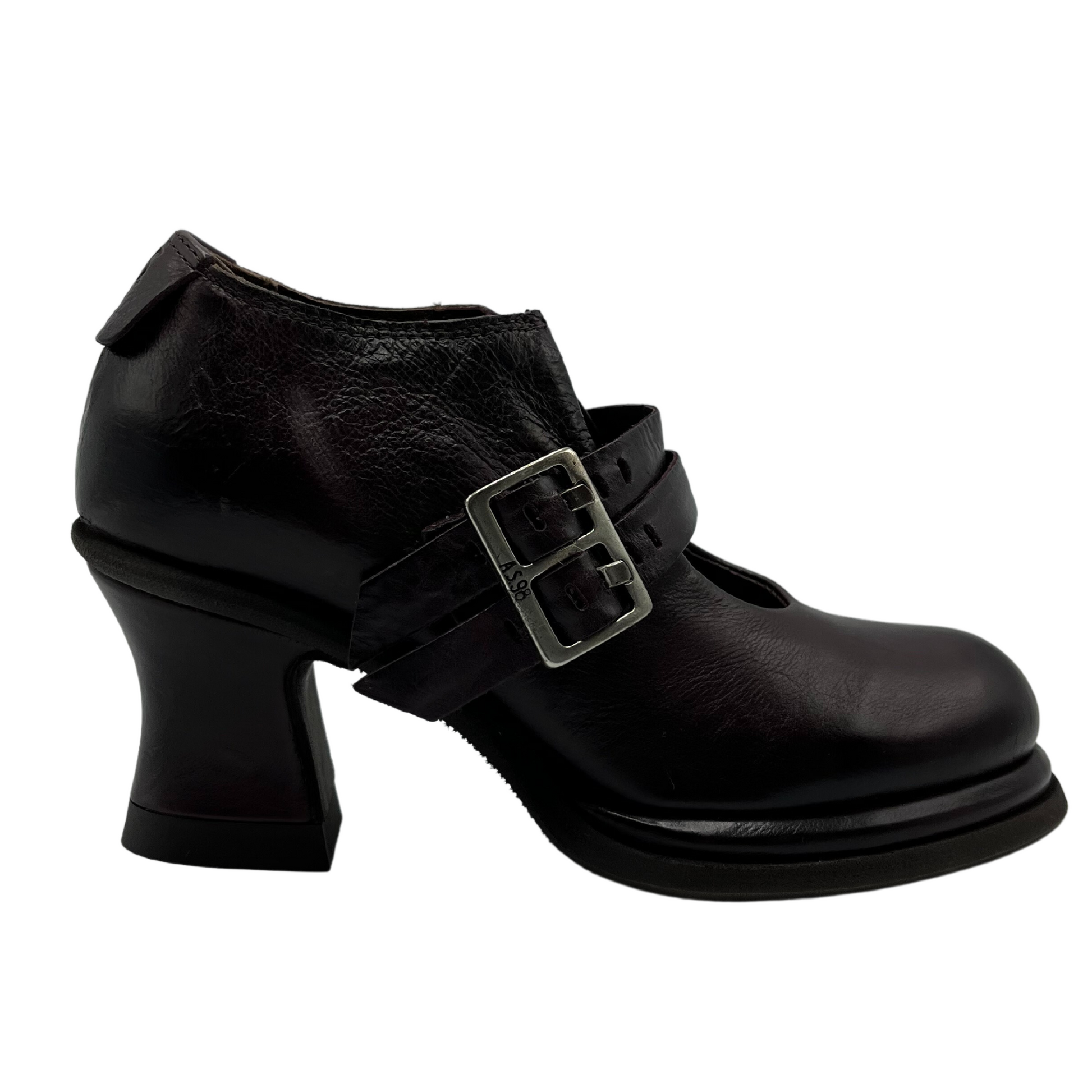 Right facing view of brown leather shoe with double buckle straps on upper and flared block heel