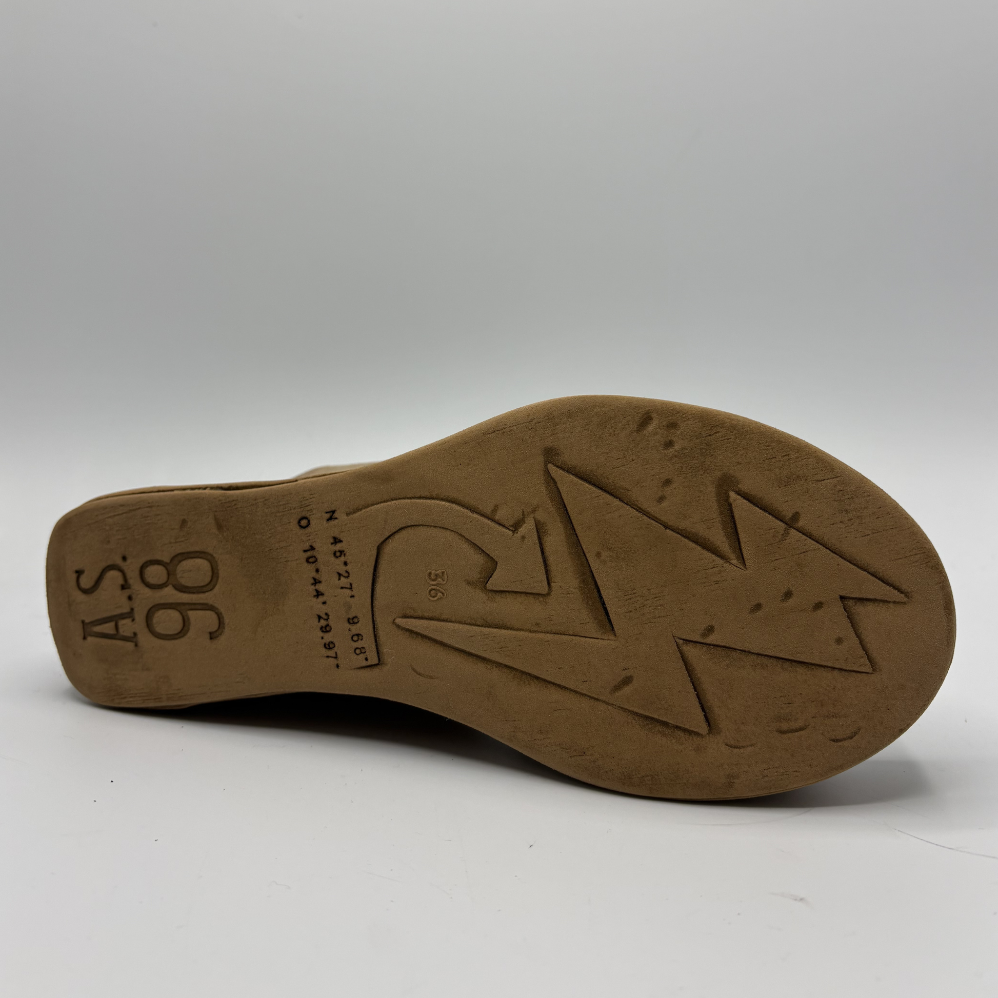 Brown shoe sole with brand logo and text on a white background