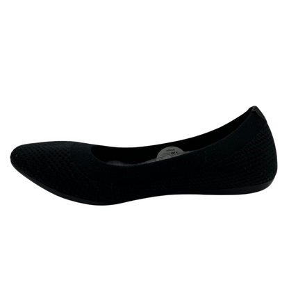 Left facing view of stretchy black ballet flat with ribbed collar and rounded toe