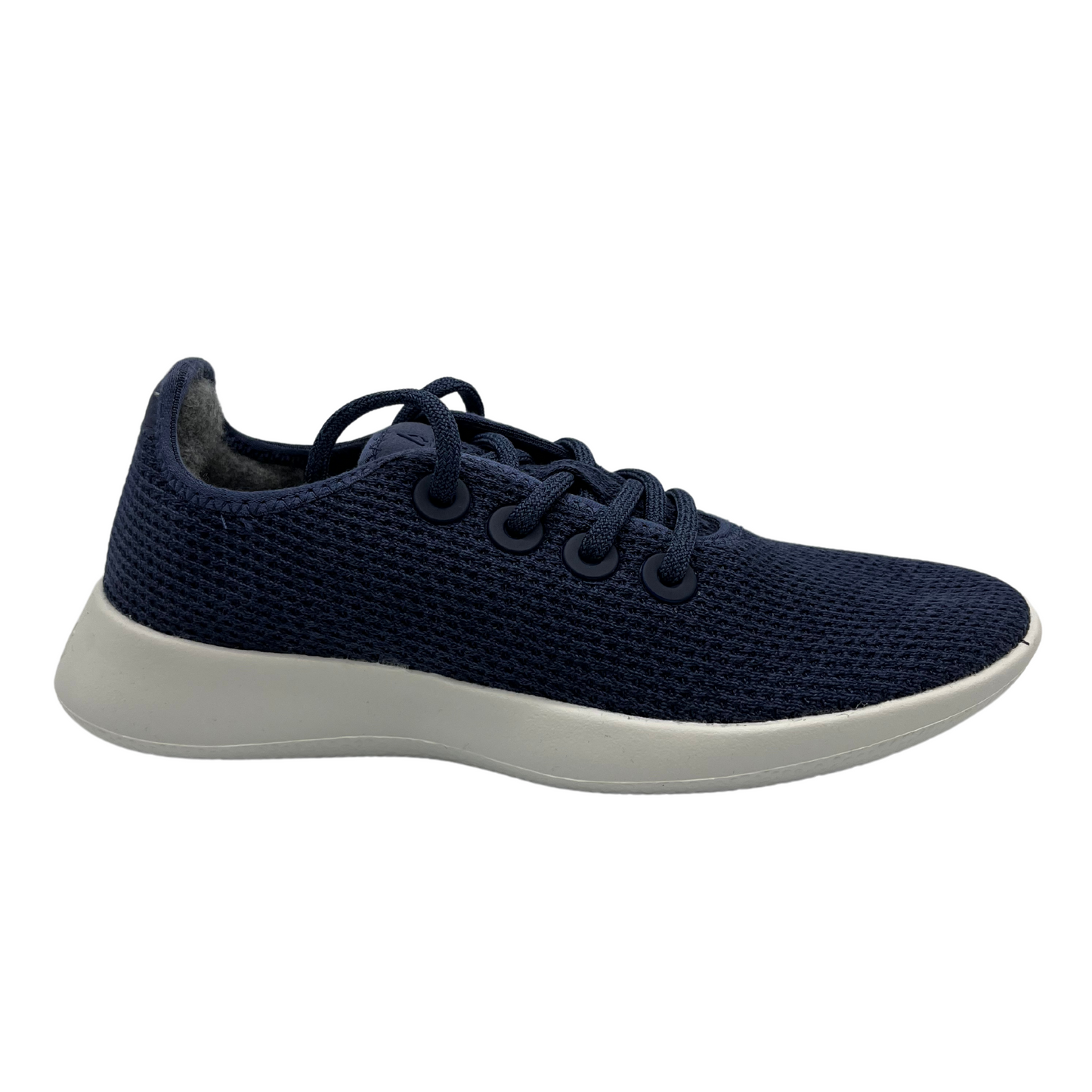 Right facing view of eucalyptus fiber running sneaker in a hazy indigo colour and white outsole.