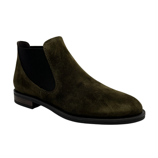 45 degree angled view of olive suede ankle booties with short heel and elastic side gores