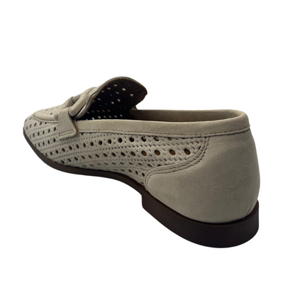 Back view of cream perforated suede loafer with matching bit detail and low heel