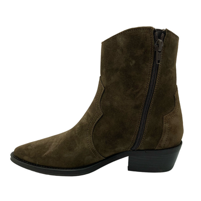 Left facing view of short suede cowboy boot with almond toe, zipper closure and stacked heel
