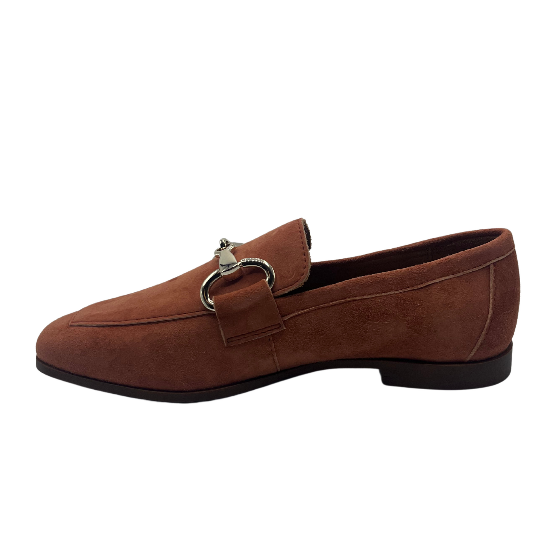 Left facing view of red brown suede loafer with silver bit detail on upper, square toe and low heel