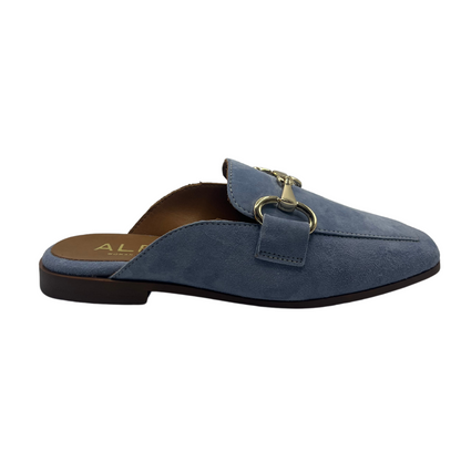 Right facing view of blue leather slip on loafer with low heel and gold bit detail on upper