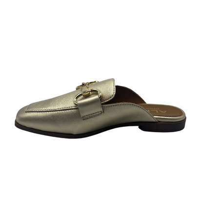 Right facing view of gold leather slip on loafer with low heel and gold bit detail on upper