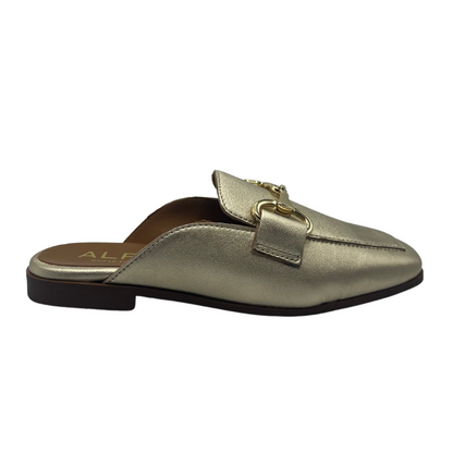Right facing view of gold leather slip on loafer with low heel and gold bit detail on upper