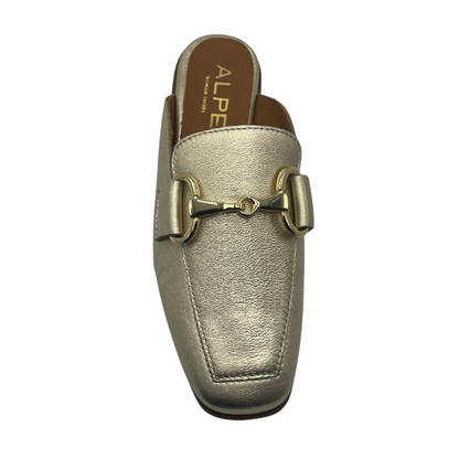 Top view of gold leather slip on loafer with low heel and gold bit detail on upper