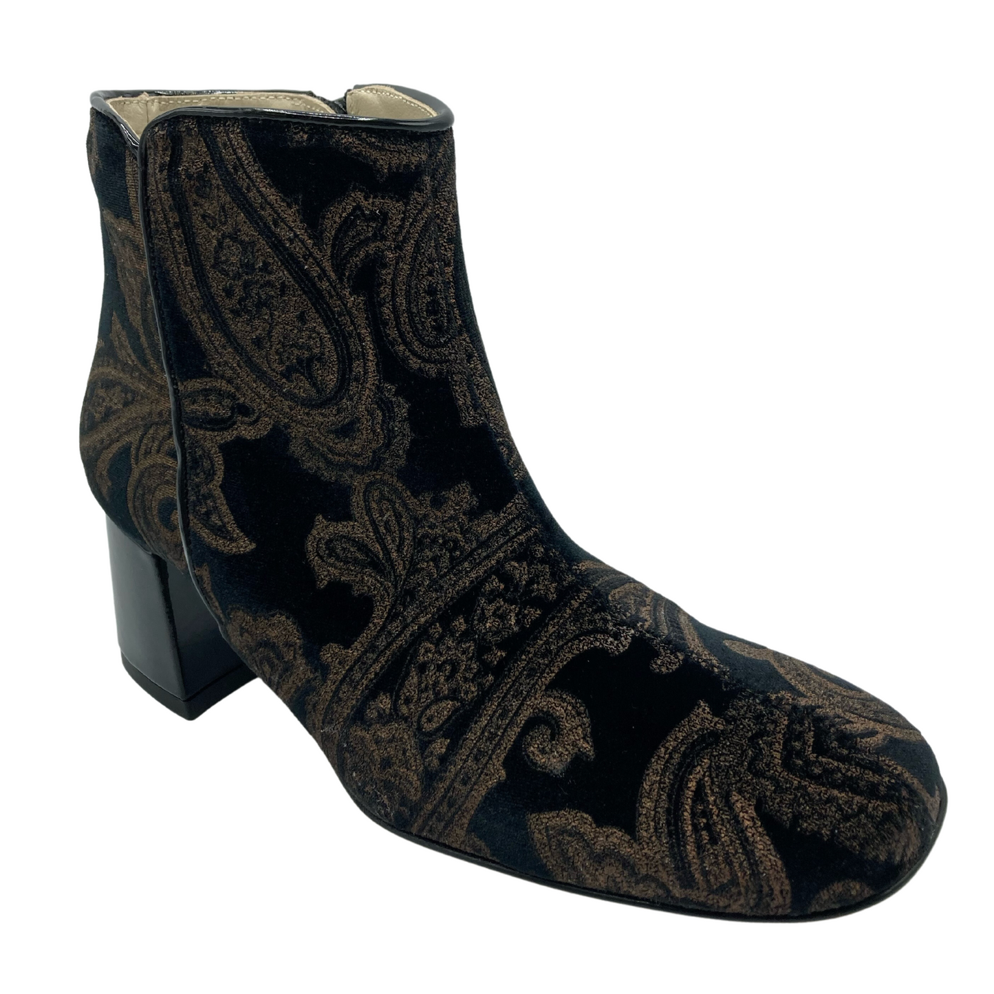 45 degree angled view of black velvet bootie with brown brocade pattern and square toe with block heel