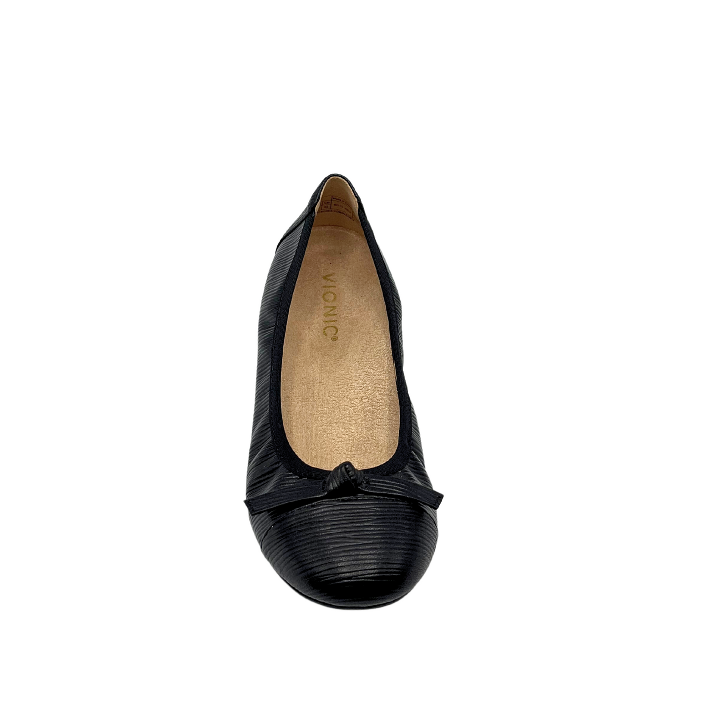 Top down view of a black leather ballet flat.  Leather is textured, features a toe cap and small leather ribbon detail on front.