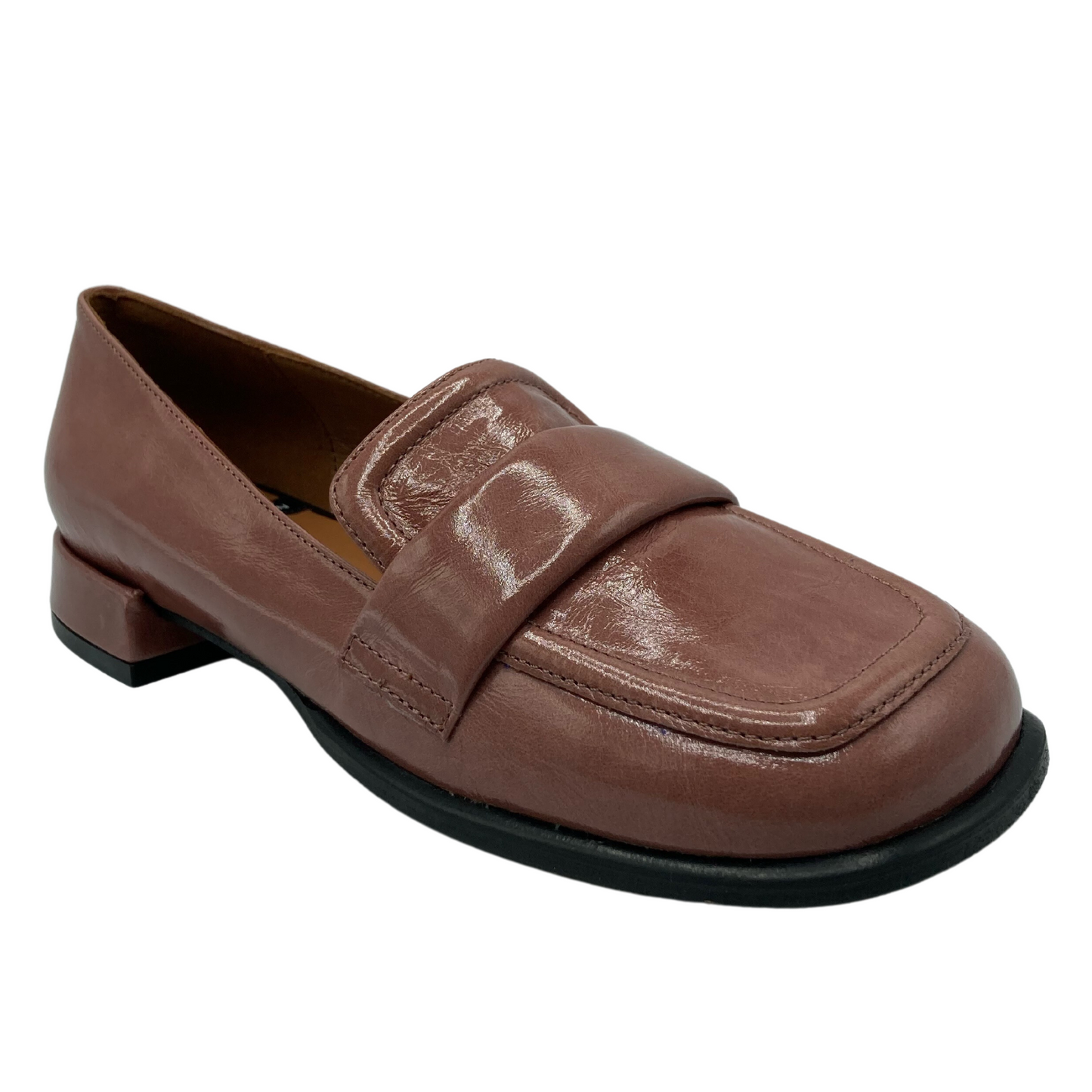45 degree angled view of brown patent leather loafer with rounded toe and low heel