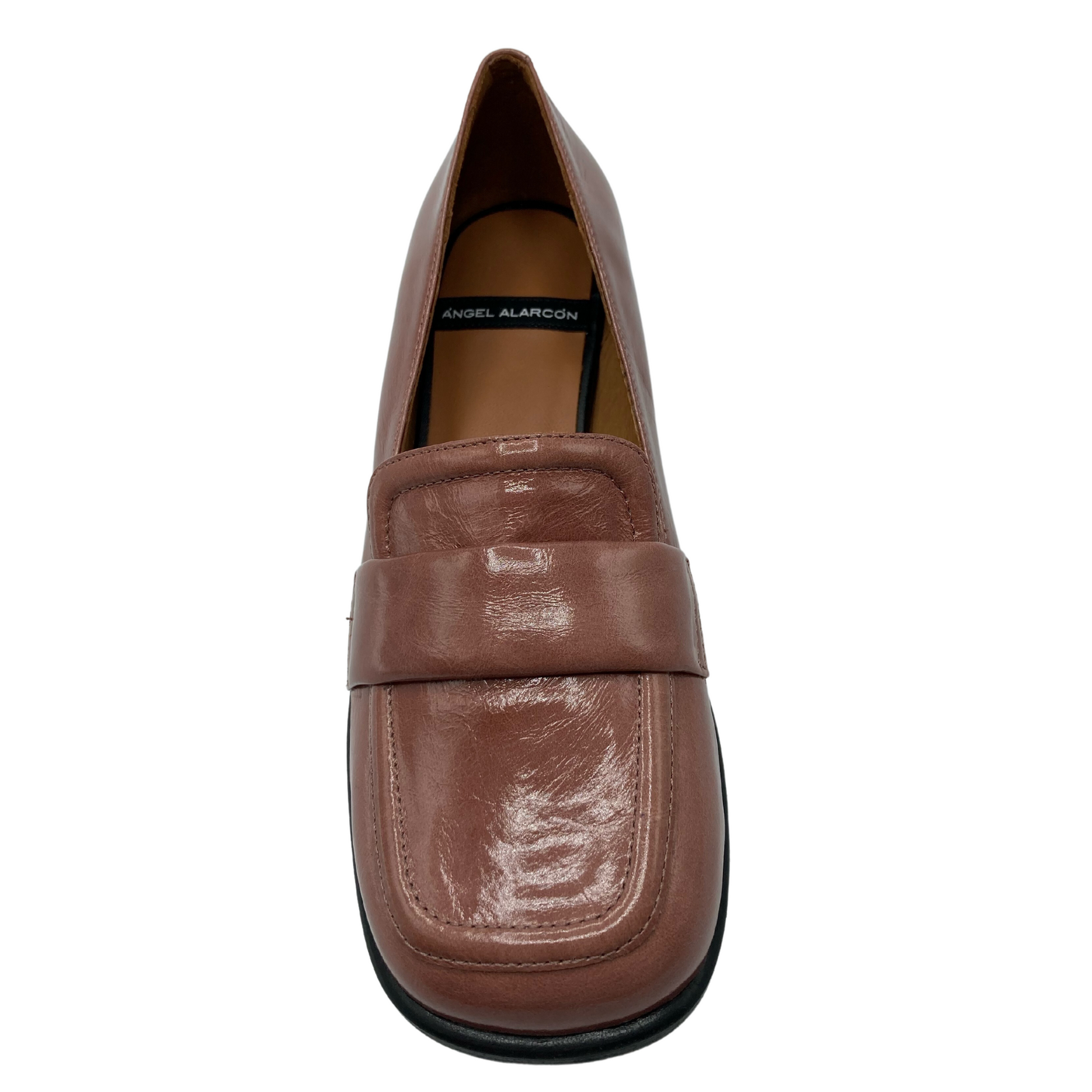 Top view of brown patent leather loafer with slight square toe