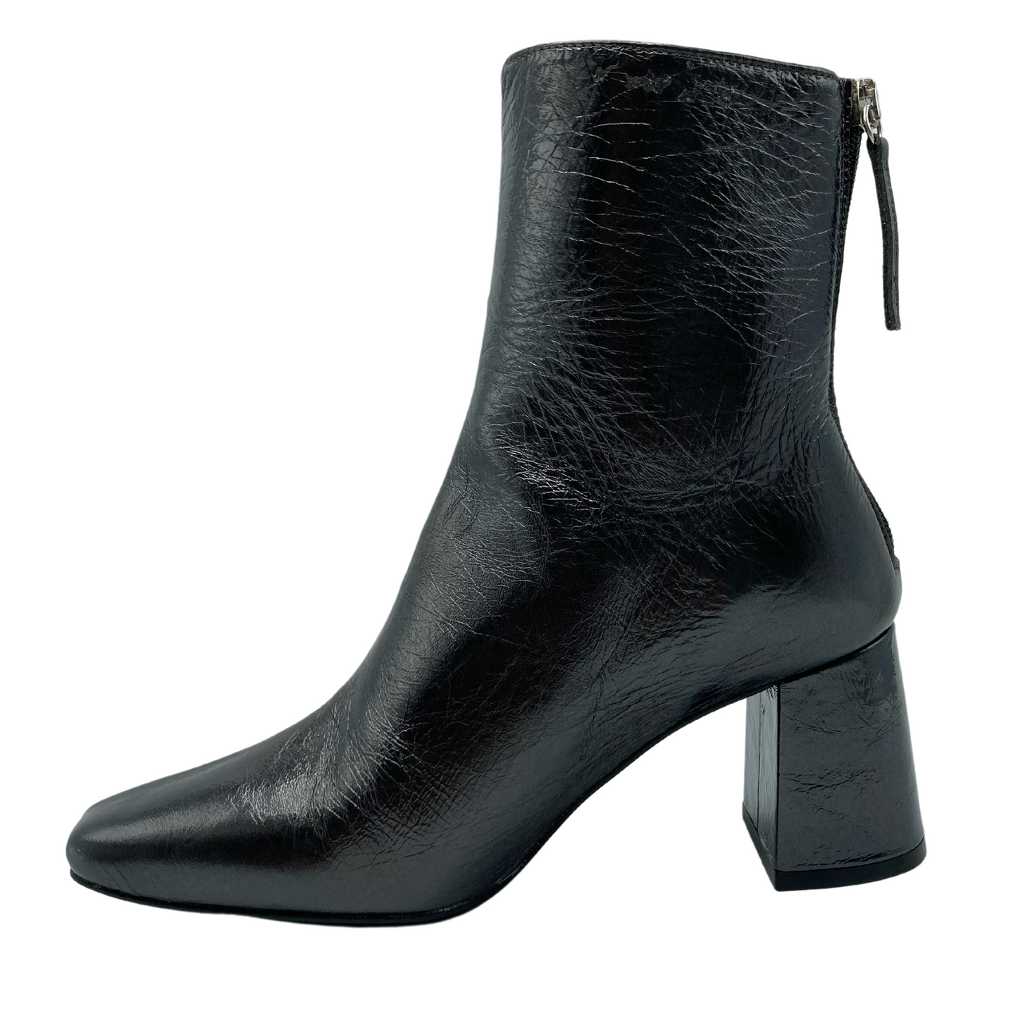 Left facing view of textured leather short boot with block heel and back zipper closure