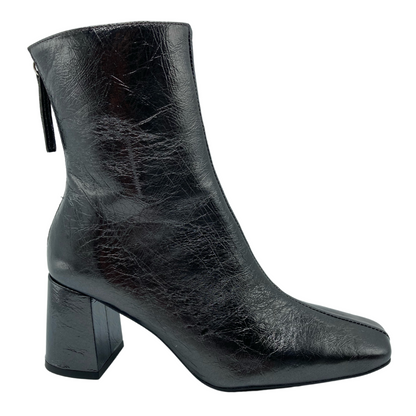 Right facing view of textured leather short boot with back zipper closure and block heel