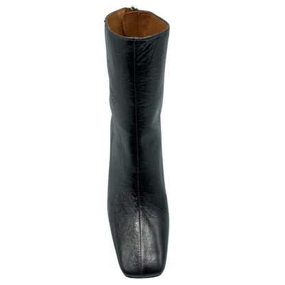 Top facing view of textured leather boot with square toe and brown lining