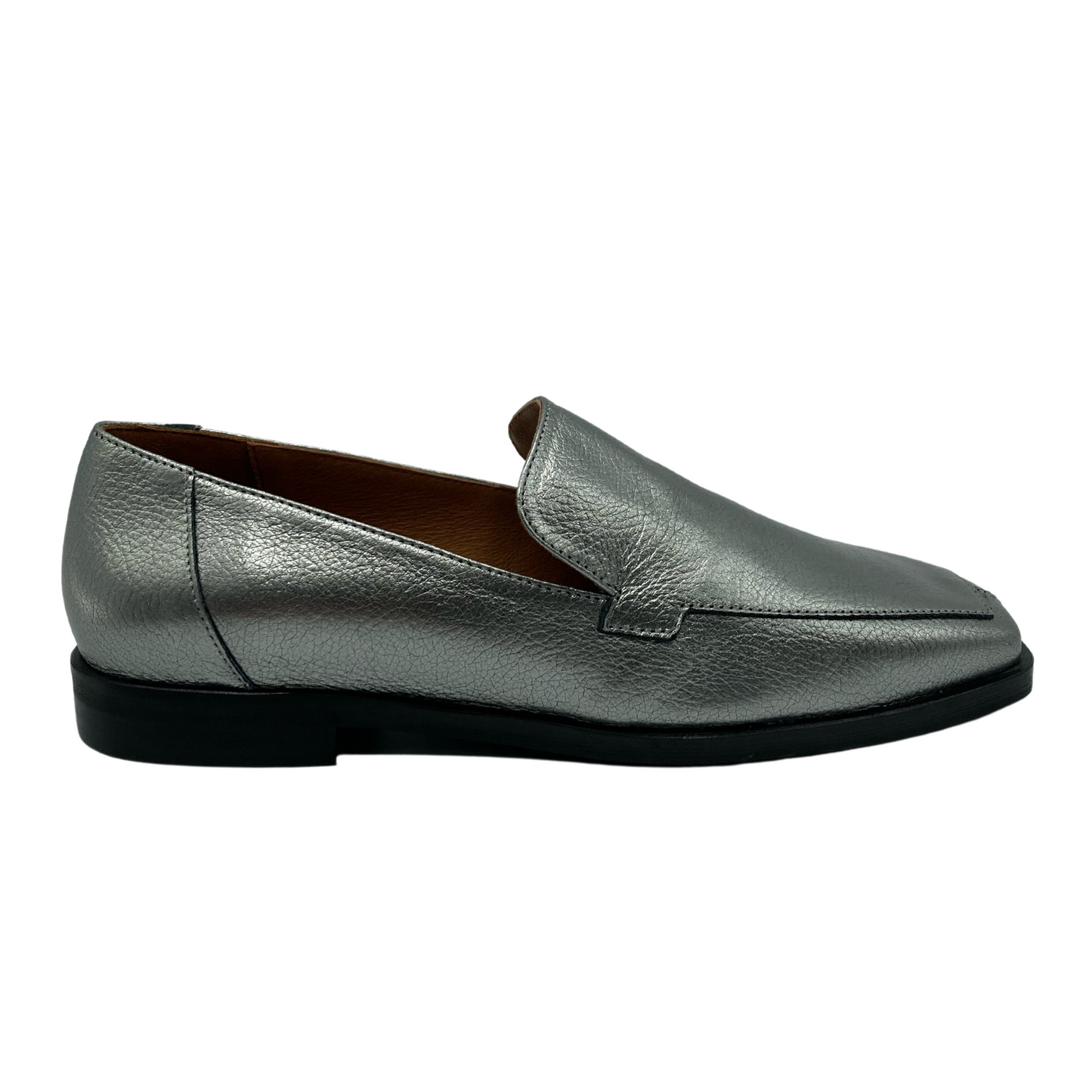 Right facing view of silver leather loafer with black outsole and leather lining