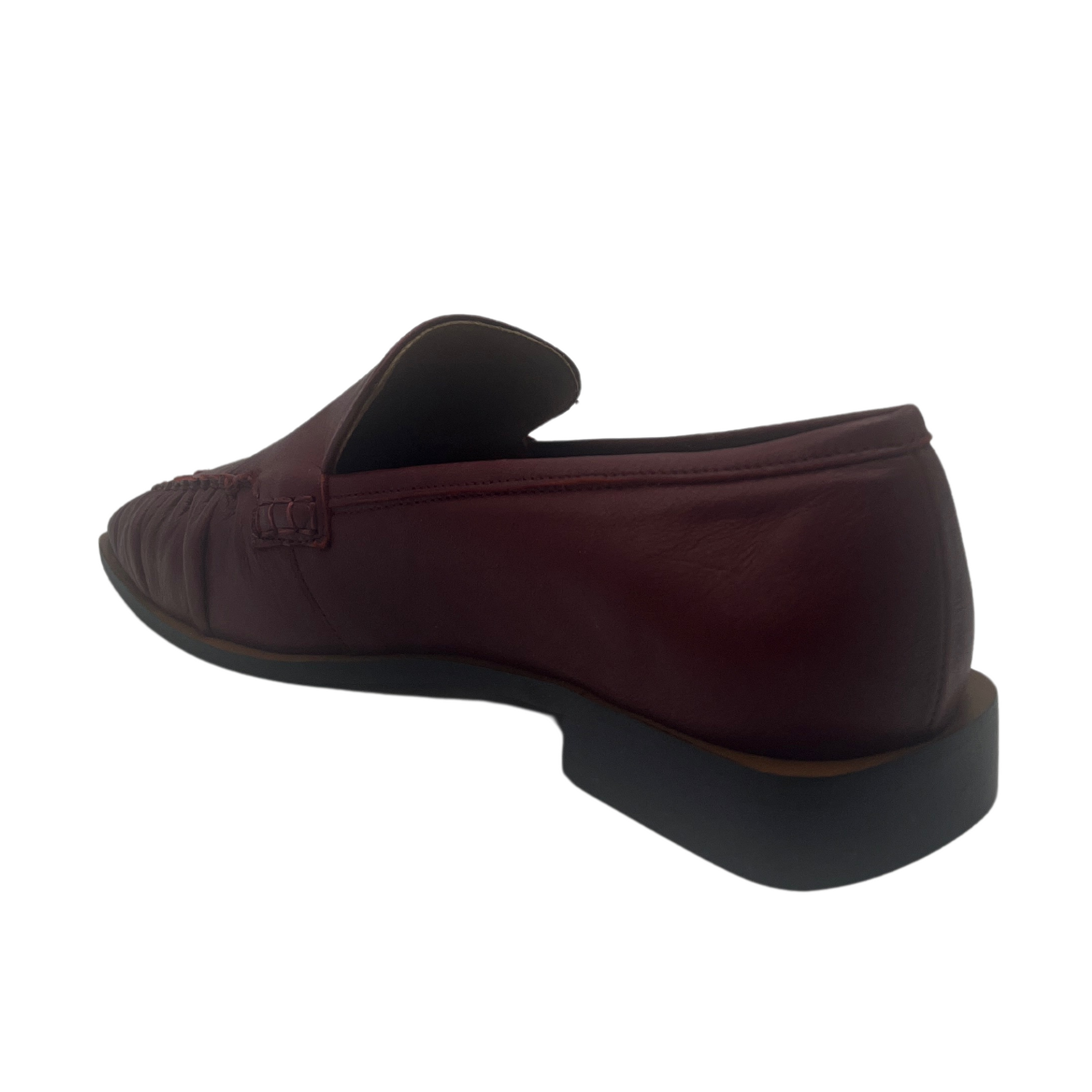 Back view of ruby red leather loafer with square toe and block heel