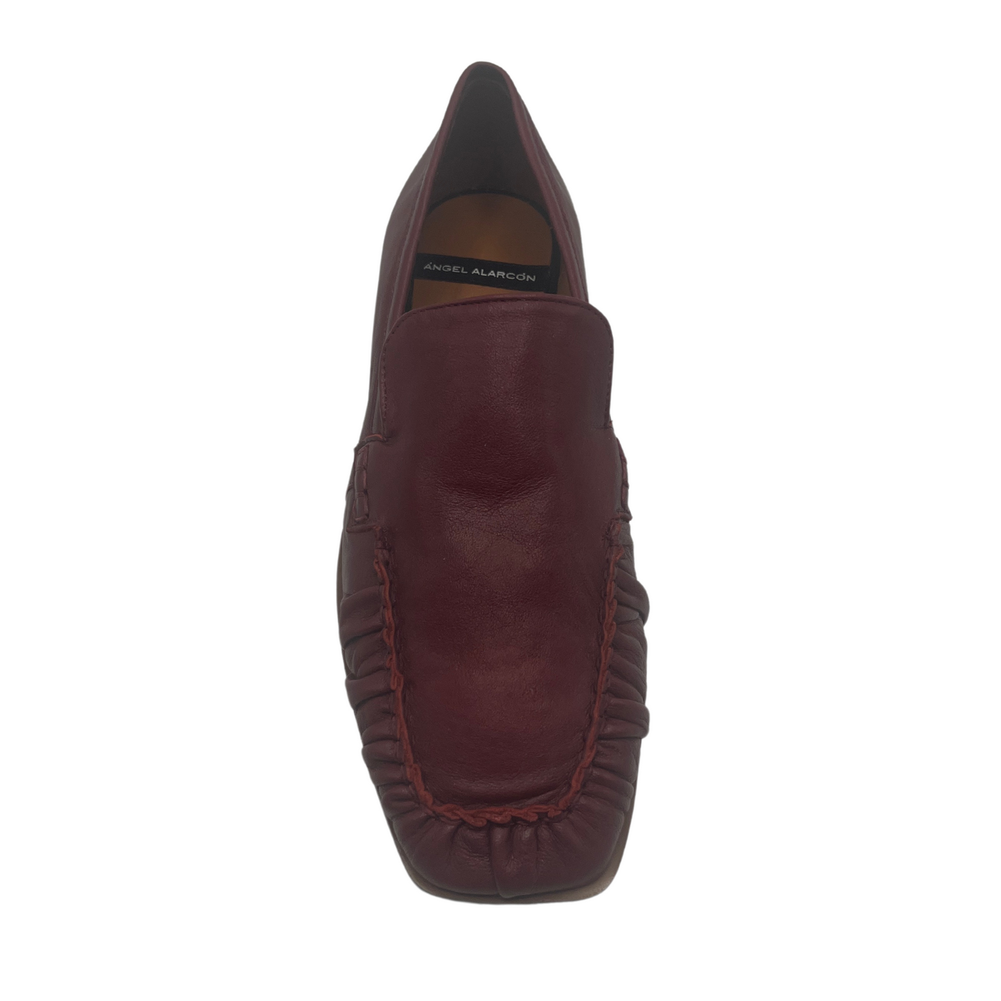 Top view of red leather loafer with square toe