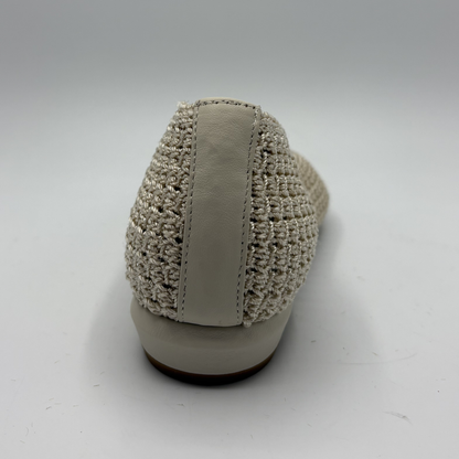 Beige woven shoe on a white background