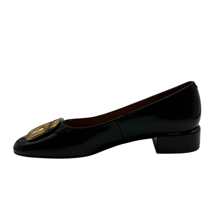 Left facing view of black patent leather ballet flat with 2.5cm heel, rounded toe and gold detail.