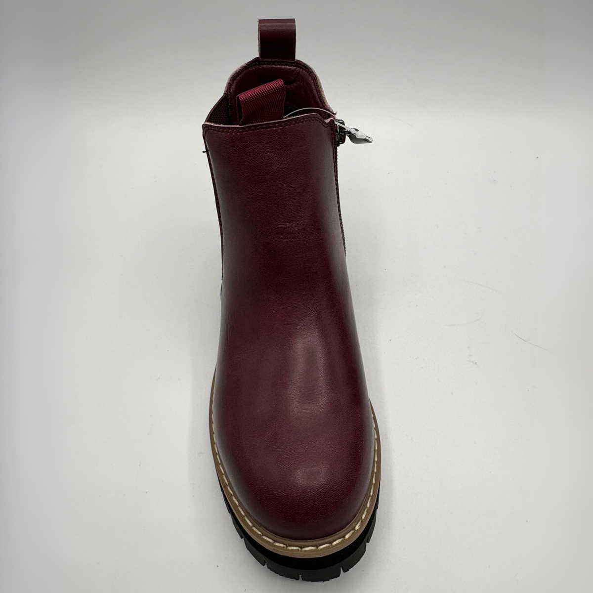 Top  view of a plum chelsea boot with an elastic side gore