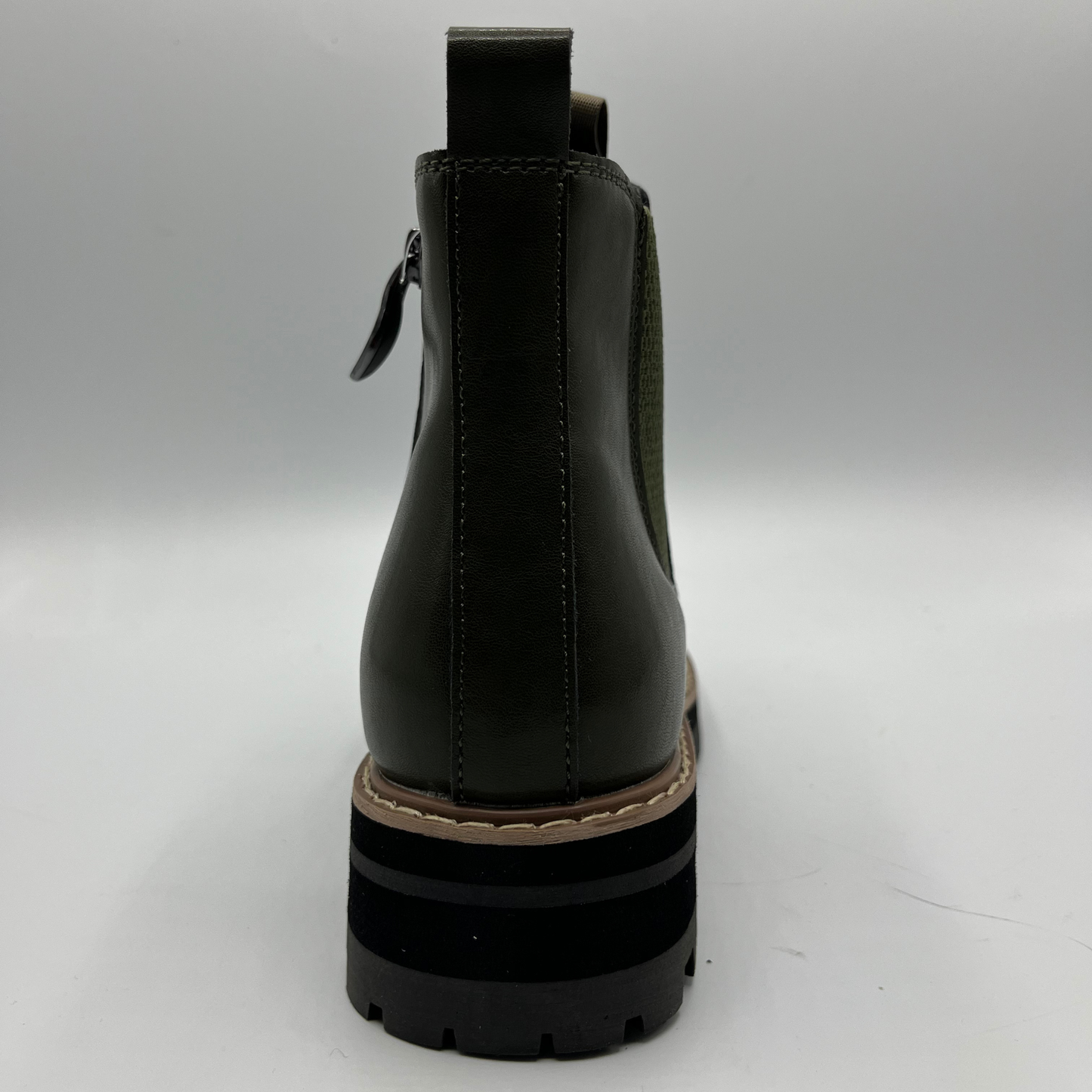 Green ankle boot on a white background